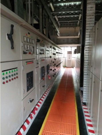 Electrical Control panel covered with Orange safety rubber mats
